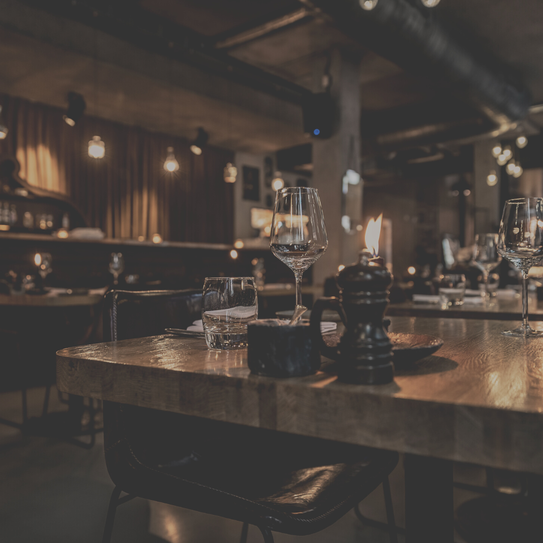Restaurant dining area supported by HVAC and refrigeration systems for comfort and food safety