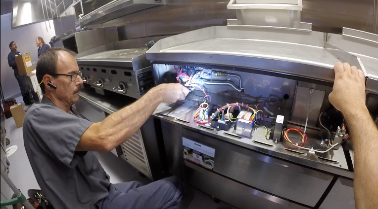 The image showcases a modern electronic device commonly found in kitchens, highlighting the intersection of technology and major appliances. This aligns with NexTech's focus on innovative HVAC solutions that enhance energy efficiency and smart home integration.